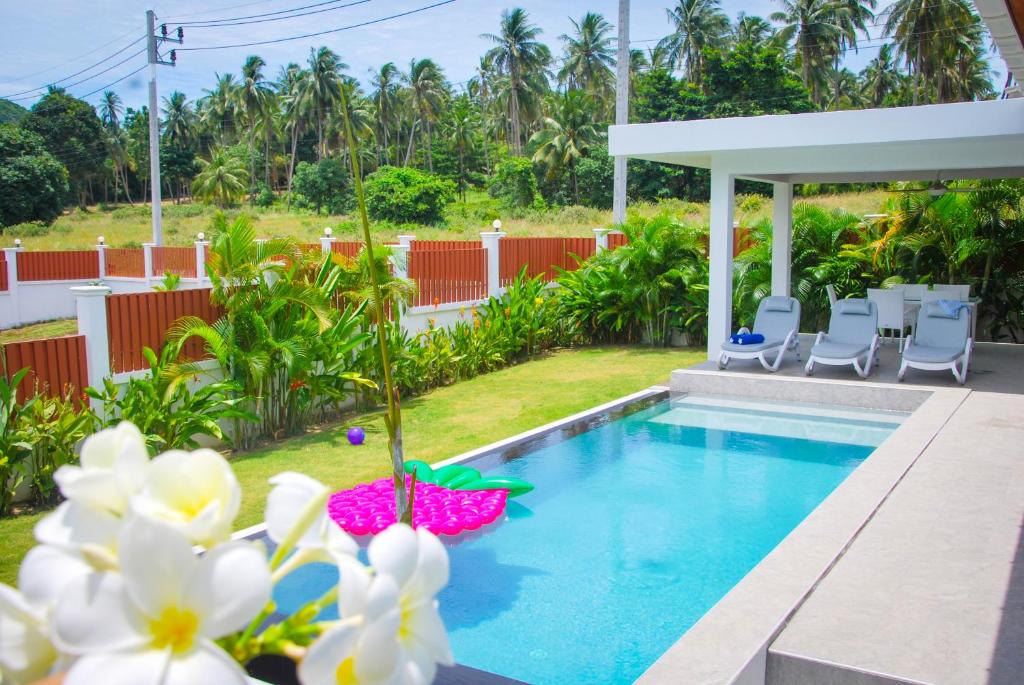 Bazén v ubytování -20 Off per cent Luxury Mango Villa nebo v jeho okolí