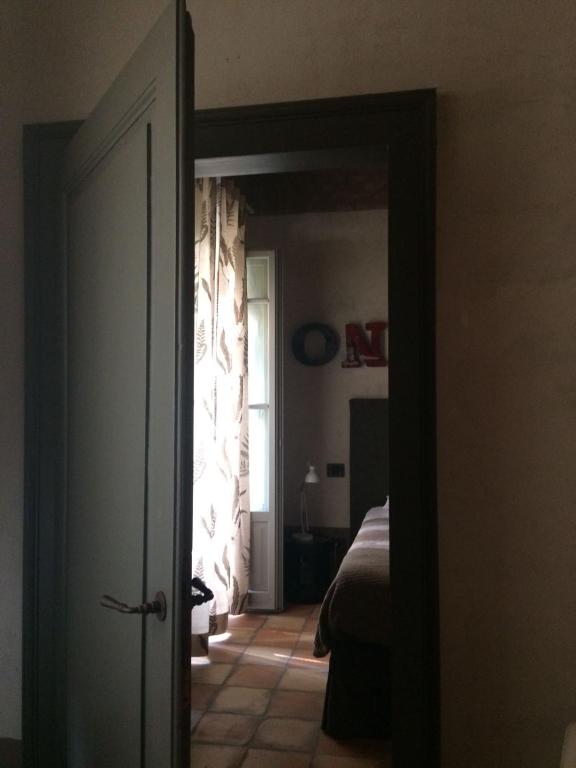 Postel nebo postele na pokoji v ubytování B&B Molino2Rosso