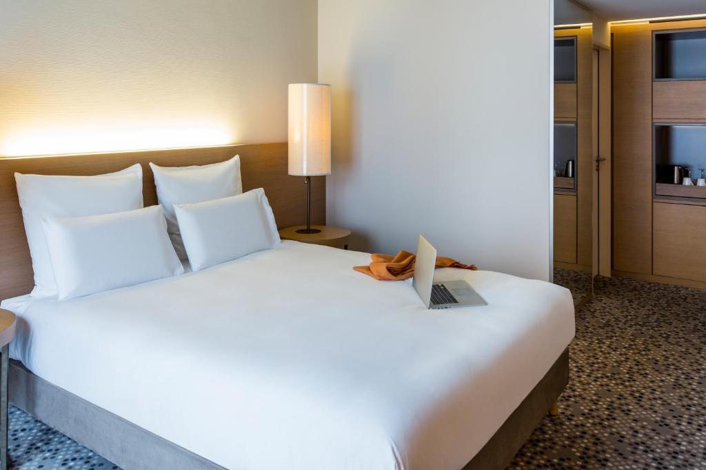 Krevet ili kreveti u jedinici u okviru objekta Pullman Basel Europe