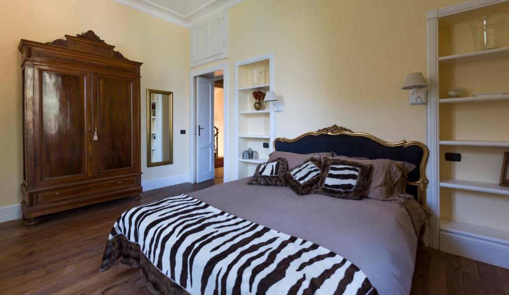 Postel nebo postele na pokoji v ubytování Villa Ortensia