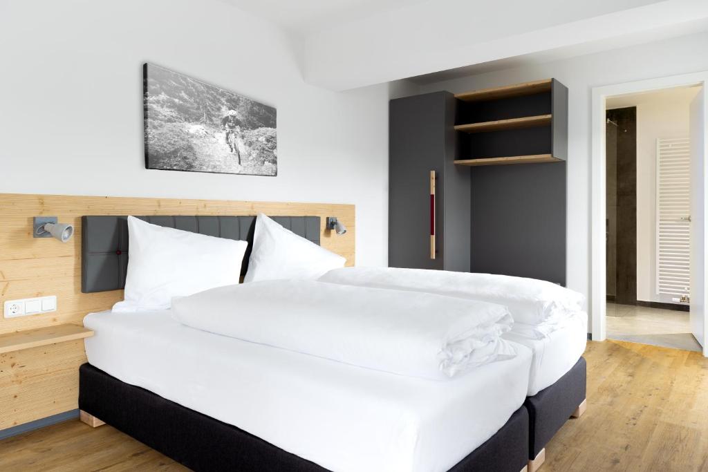 Postel nebo postele na pokoji v ubytování K1 Hotel Willingen