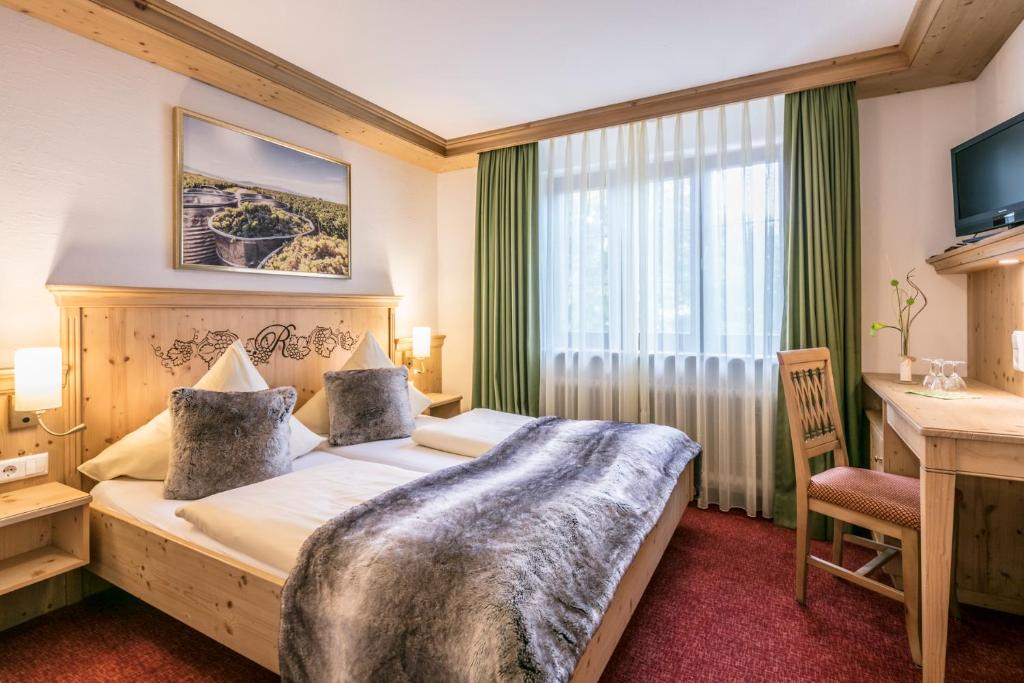 Postel nebo postele na pokoji v ubytování Hotel - Landgasthof Rebstock