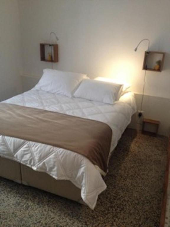 Cama o camas de una habitación en Ida Chambres d'hôtes B&B