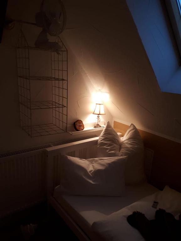 Postel nebo postele na pokoji v ubytování Guest House Dommitzsch