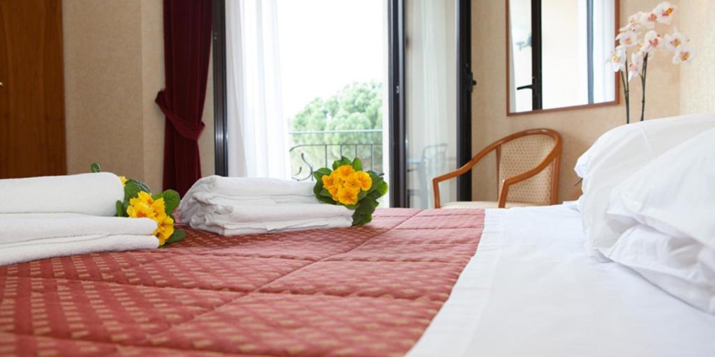Postel nebo postele na pokoji v ubytování Parc Hotel