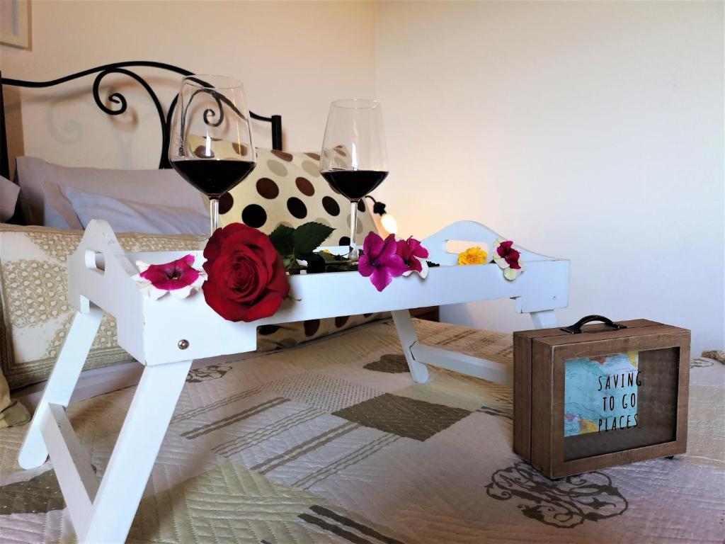 Televízia a/alebo spoločenská miestnosť v ubytovaní Agriturismo Palazzo Conti - B