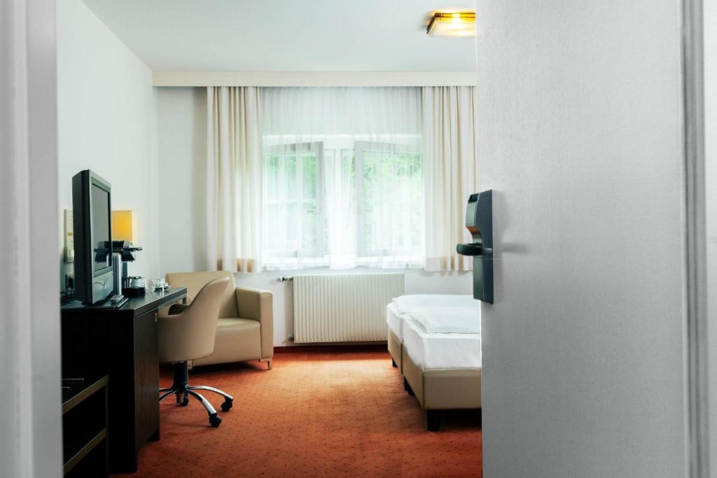 Postel nebo postele na pokoji v ubytování Hotel Plattenwirt
