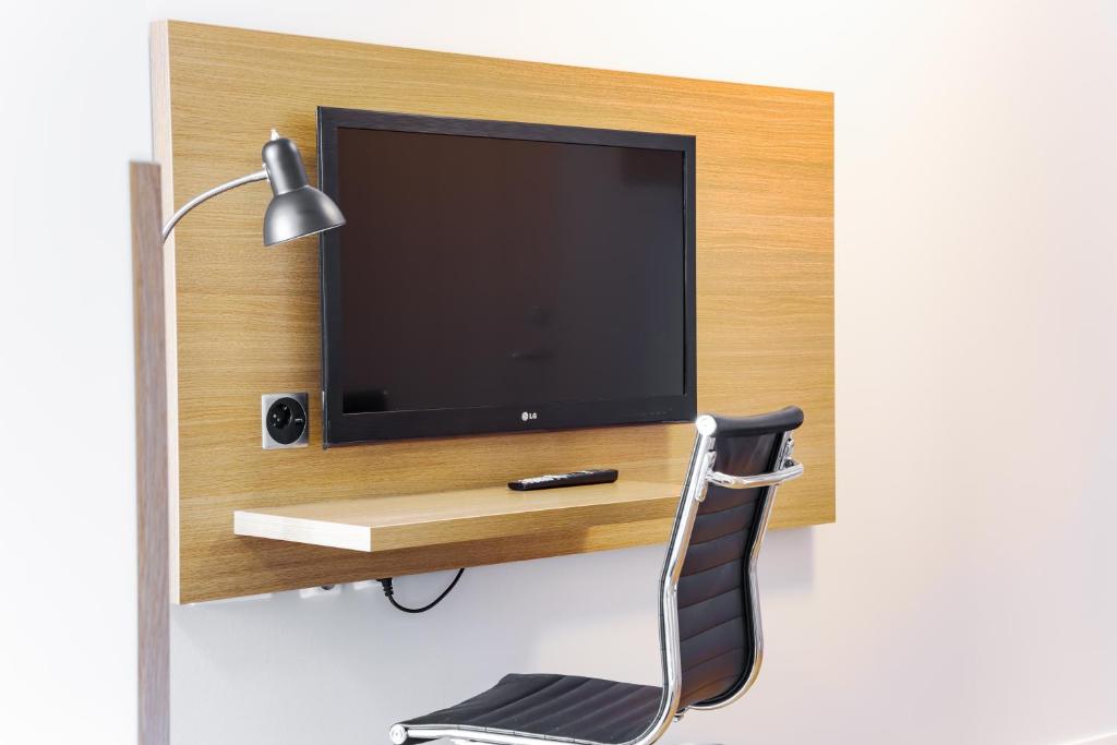 TV a/nebo společenská místnost v ubytování Hotel Spekeröd