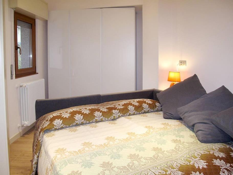 Postel nebo postele na pokoji v ubytování Vittoria Residence