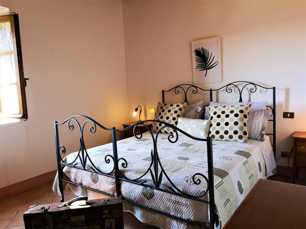 Posteľ alebo postele v izbe v ubytovaní Agriturismo Palazzo Conti - B