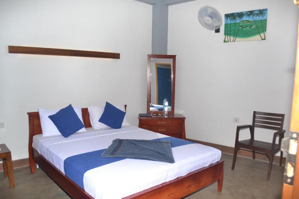 Postel nebo postele na pokoji v ubytování Hotel Thilon
