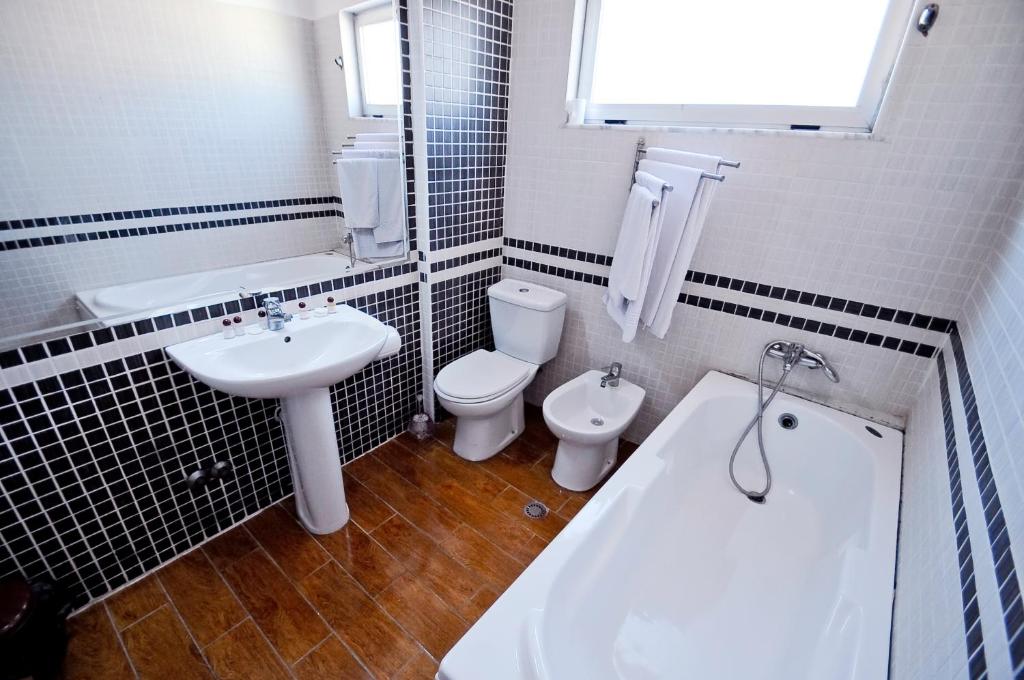 Koupelna v ubytování Hotel Lubjana