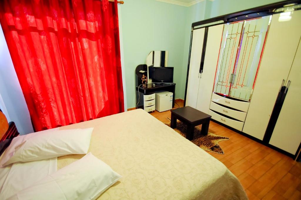 Postel nebo postele na pokoji v ubytování Hotel Lubjana