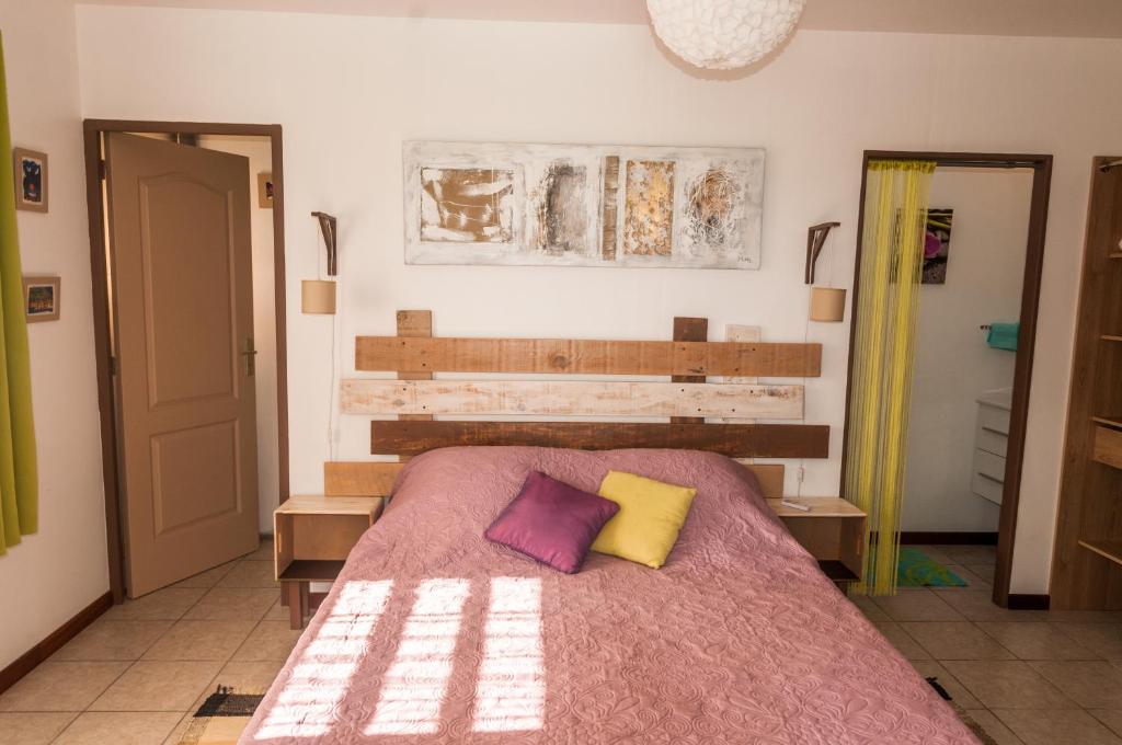 Ένα ή περισσότερα κρεβάτια σε δωμάτιο στο Fleur de canne