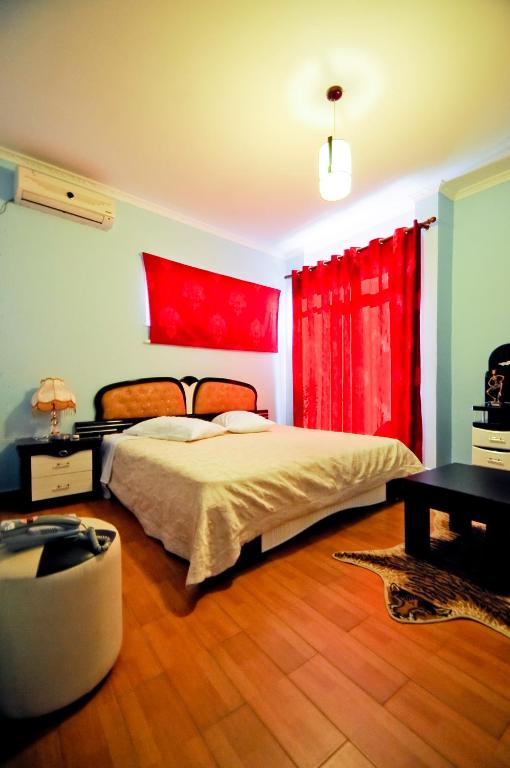 Postel nebo postele na pokoji v ubytování Hotel Lubjana
