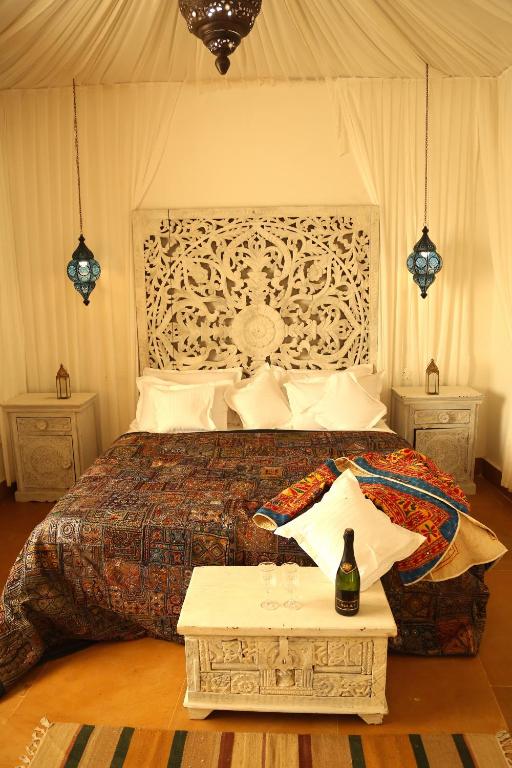Postel nebo postele na pokoji v ubytování Casa De Kaku Jaisalmer