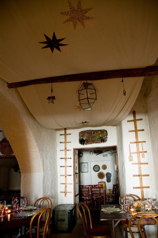 Reštaurácia alebo iné gastronomické zariadenie v ubytovaní Agriturismo Mustilli
