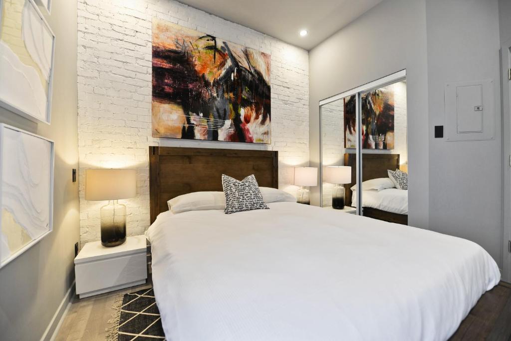 Postel nebo postele na pokoji v ubytování Stanley Court Apartments by Simplissimmo