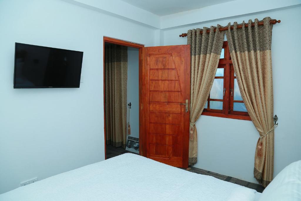 Ein Bett oder Betten in einem Zimmer der Unterkunft AGP home