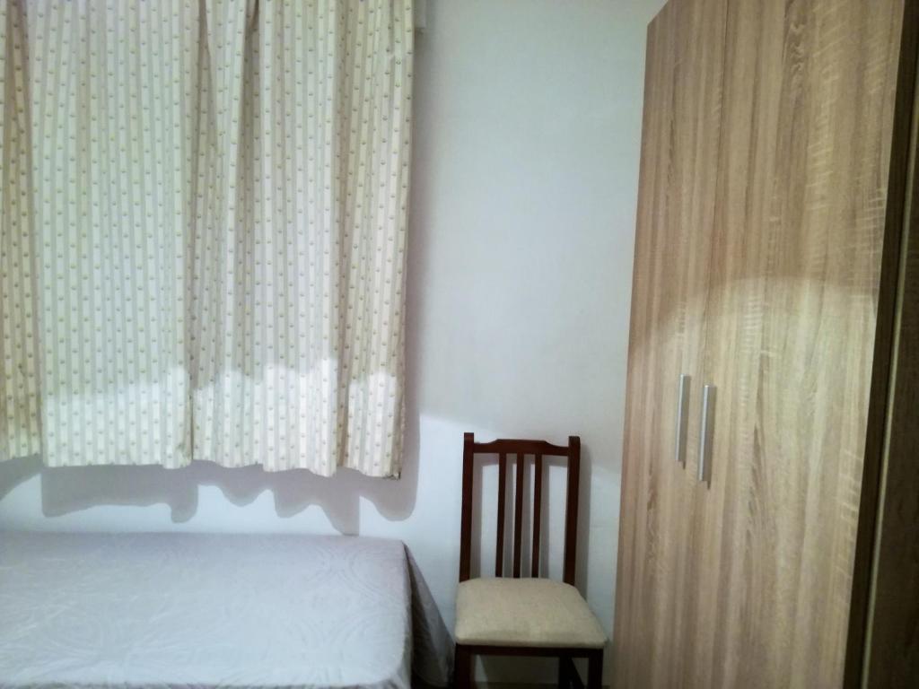 Postel nebo postele na pokoji v ubytování VIVIENDA COMPLETA EN SEVILLA