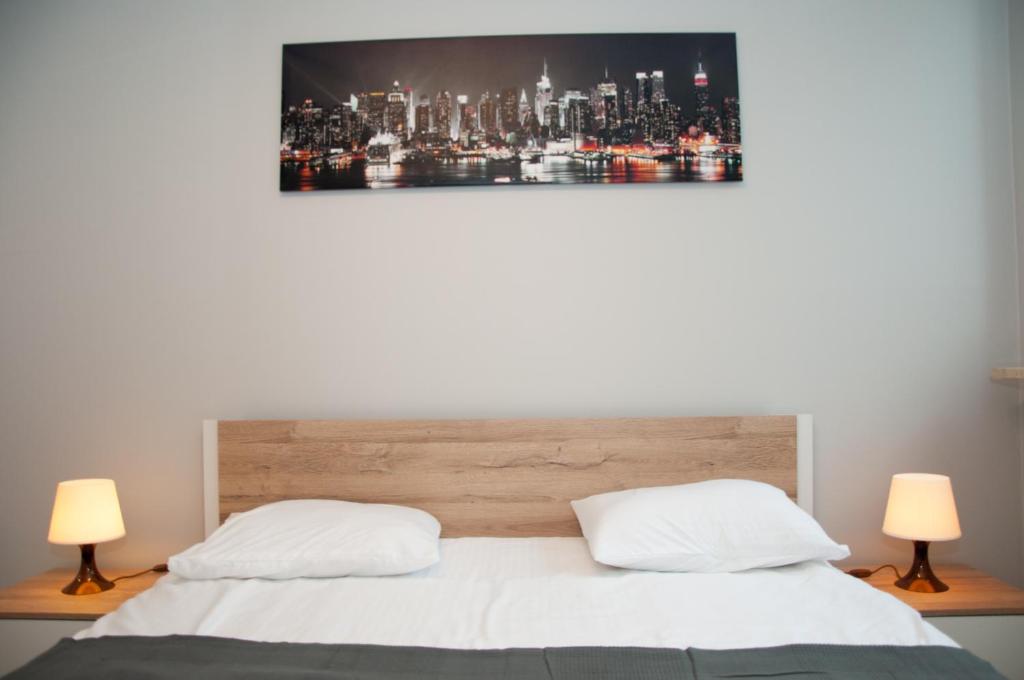 Posteľ alebo postele v izbe v ubytovaní Apartament Cybernetyki Mokotów