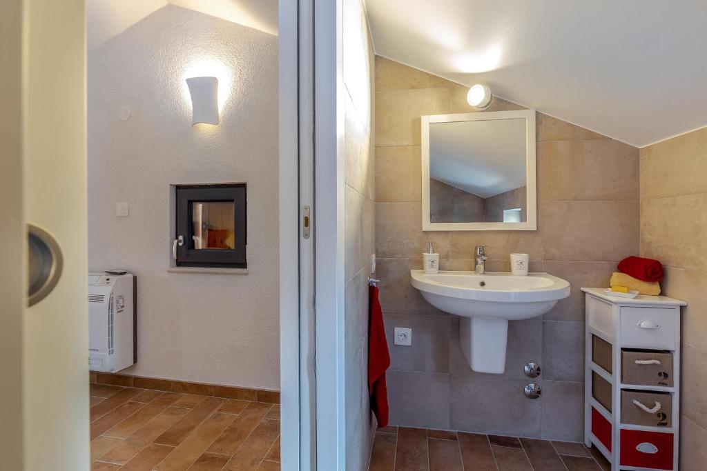 Koupelna v ubytování Apartment Li