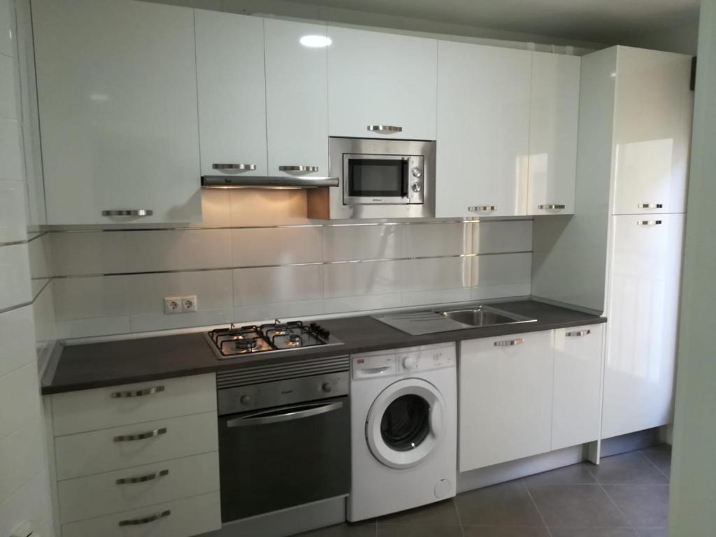 A kitchen or kitchenette at Apartamento Nuevo Duplex
