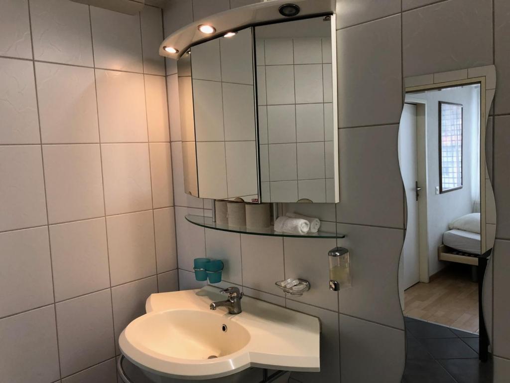 Un baño de SASS APARTHOTEL