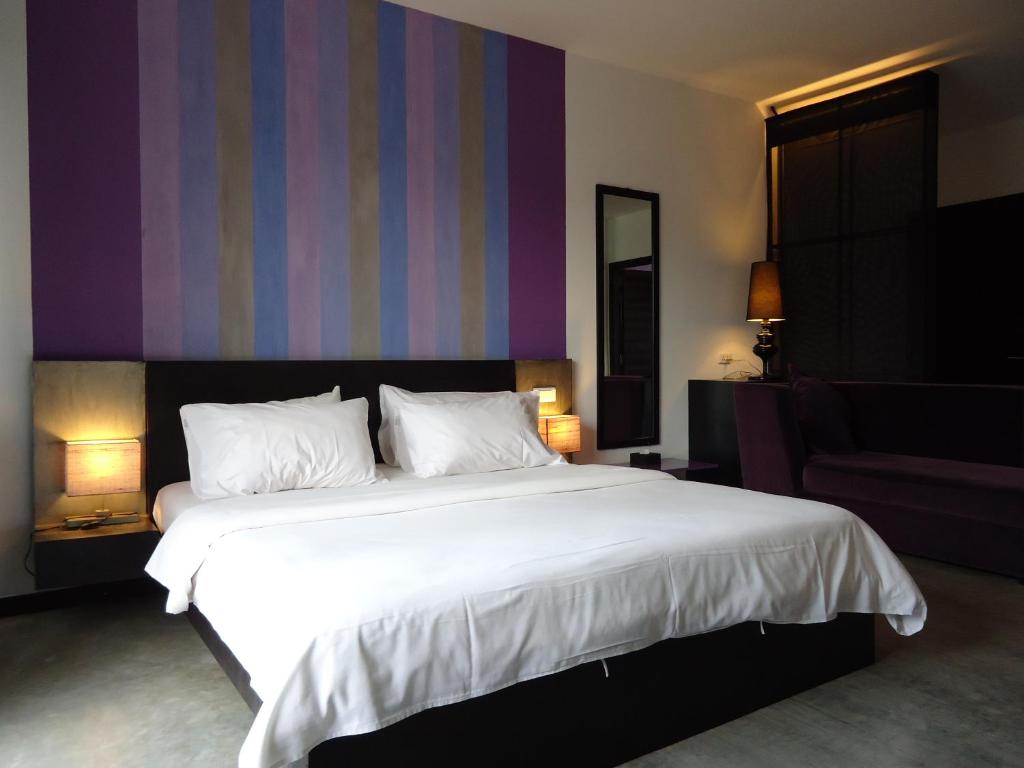 Postel nebo postele na pokoji v ubytování MEN's Resort & Spa (Gay Hotel)