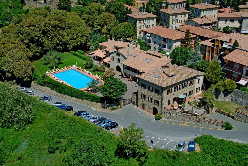 an aerial view of a house with a swimming pool at Villa Nencini in Volterra