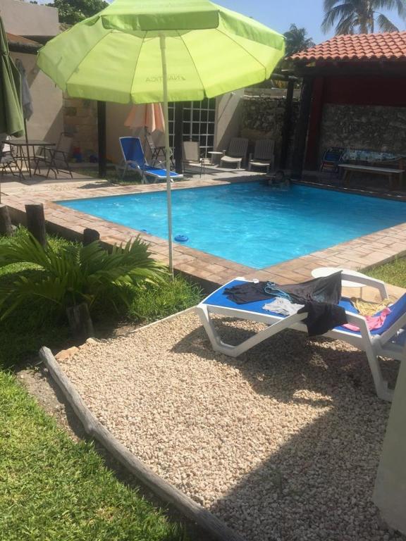 Bazén v ubytování CASA KINICH SISAL nebo v jeho okolí