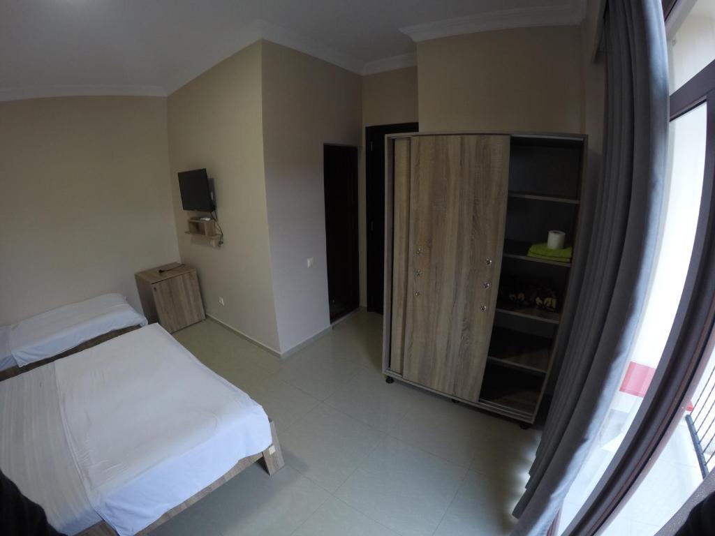 Rúm í herbergi á Hotel Estonia Two