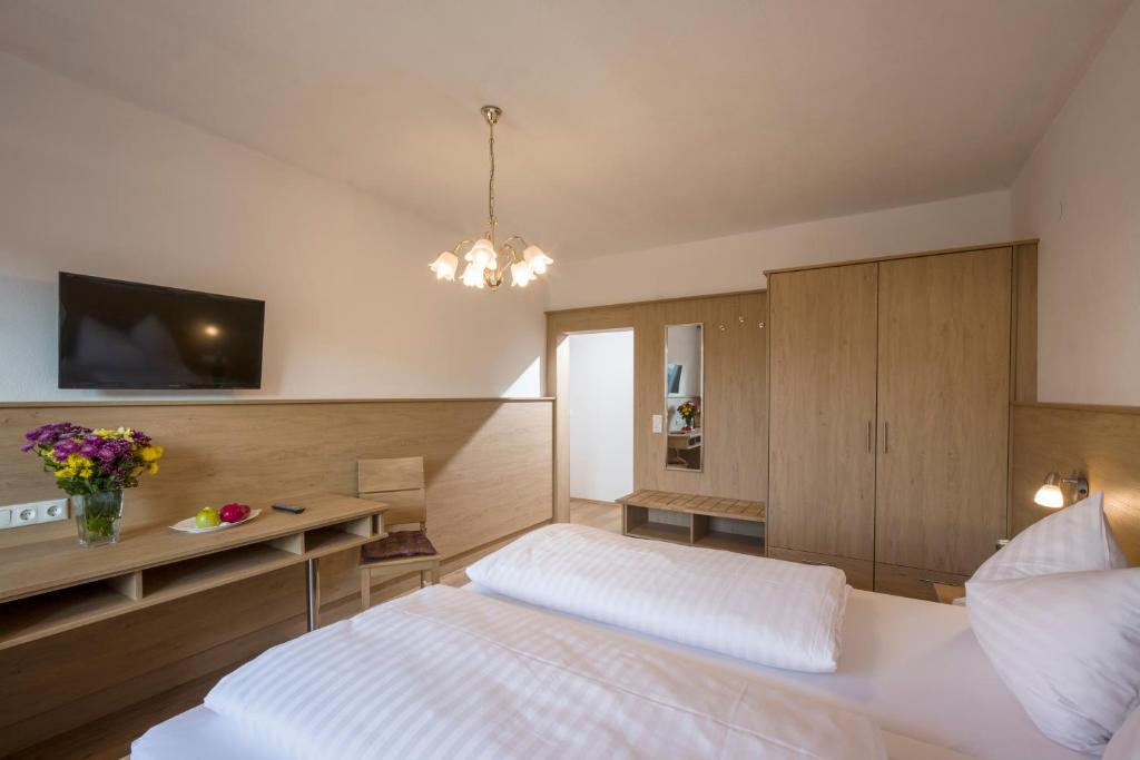 Postel nebo postele na pokoji v ubytování Hotel Restaurant Gradlwirt