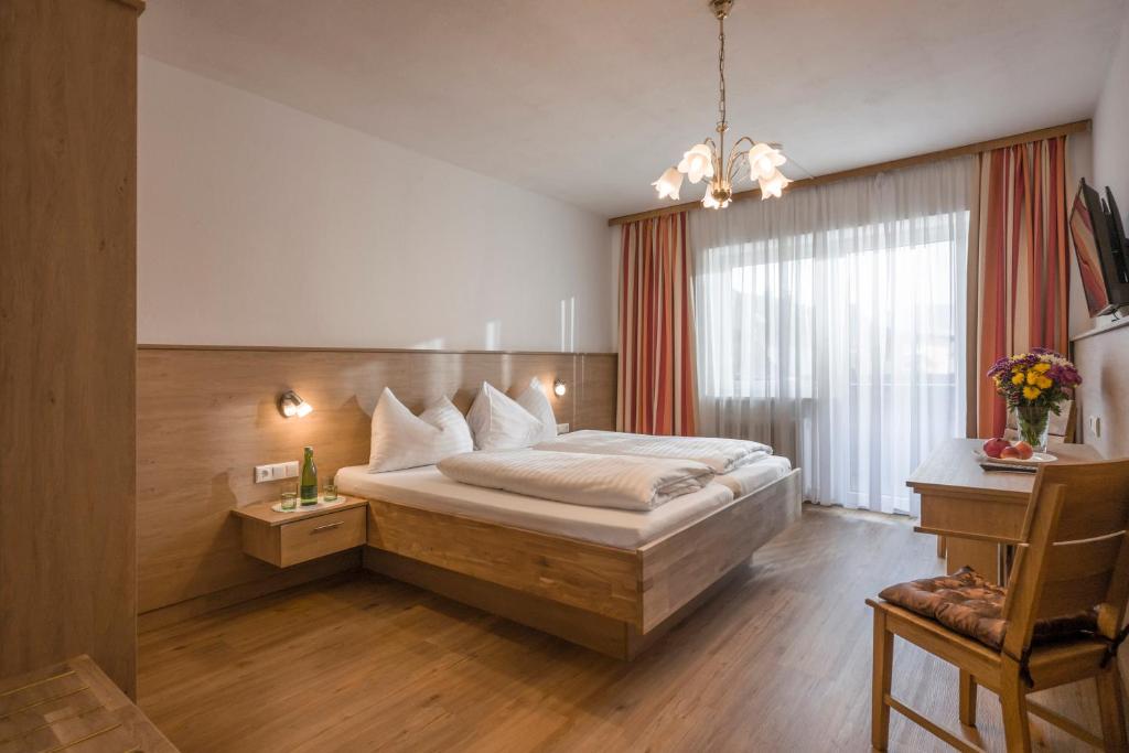 Postel nebo postele na pokoji v ubytování Hotel Restaurant Gradlwirt