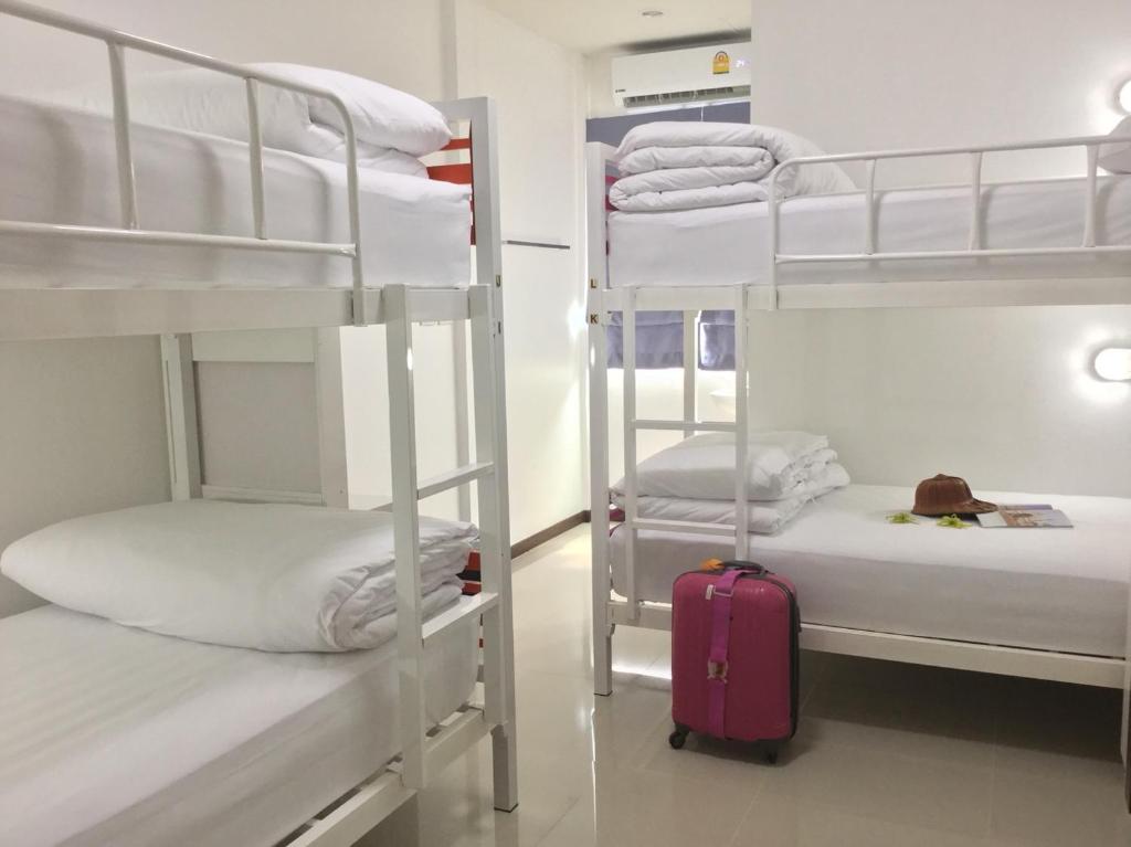 Postel nebo postele na pokoji v ubytování SABUN-NGA HOSTEL