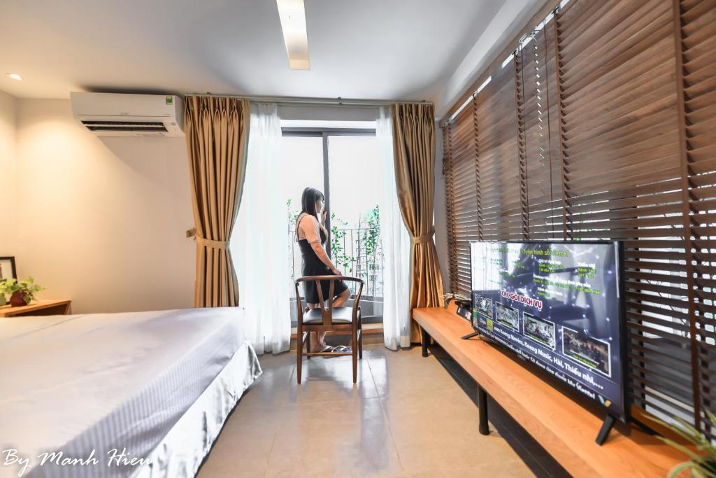 TV a/nebo společenská místnost v ubytování Mojzo Inn Boutique Hotel