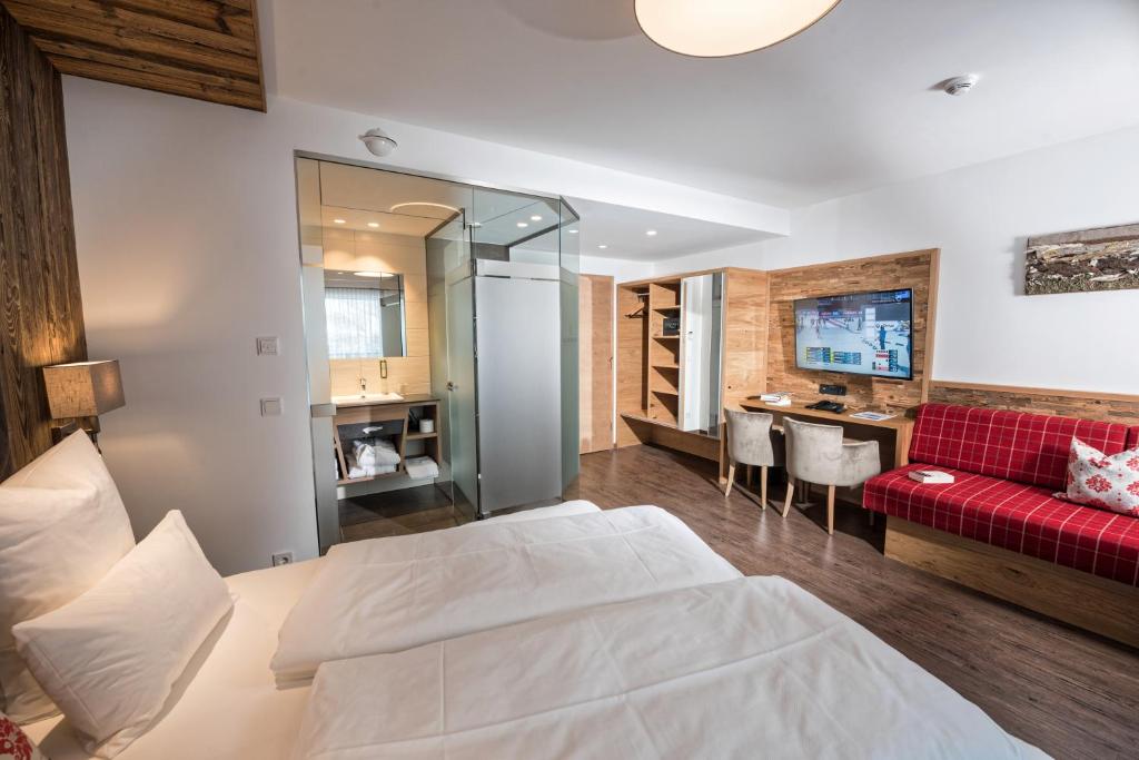 Postel nebo postele na pokoji v ubytování Hotel Eldorado