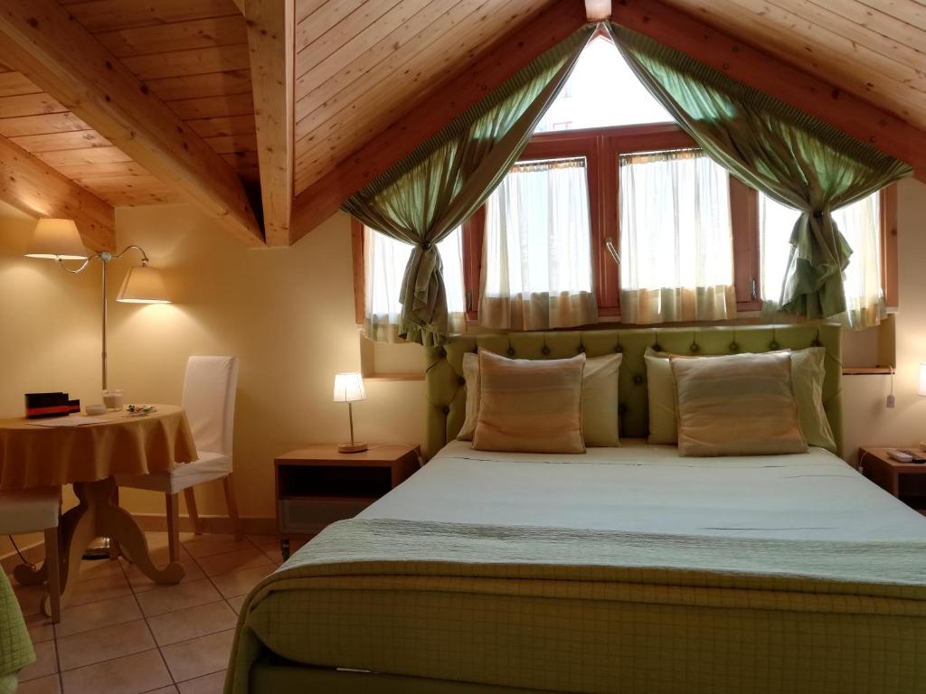 Postel nebo postele na pokoji v ubytování B&B Domus Traiani Benevento