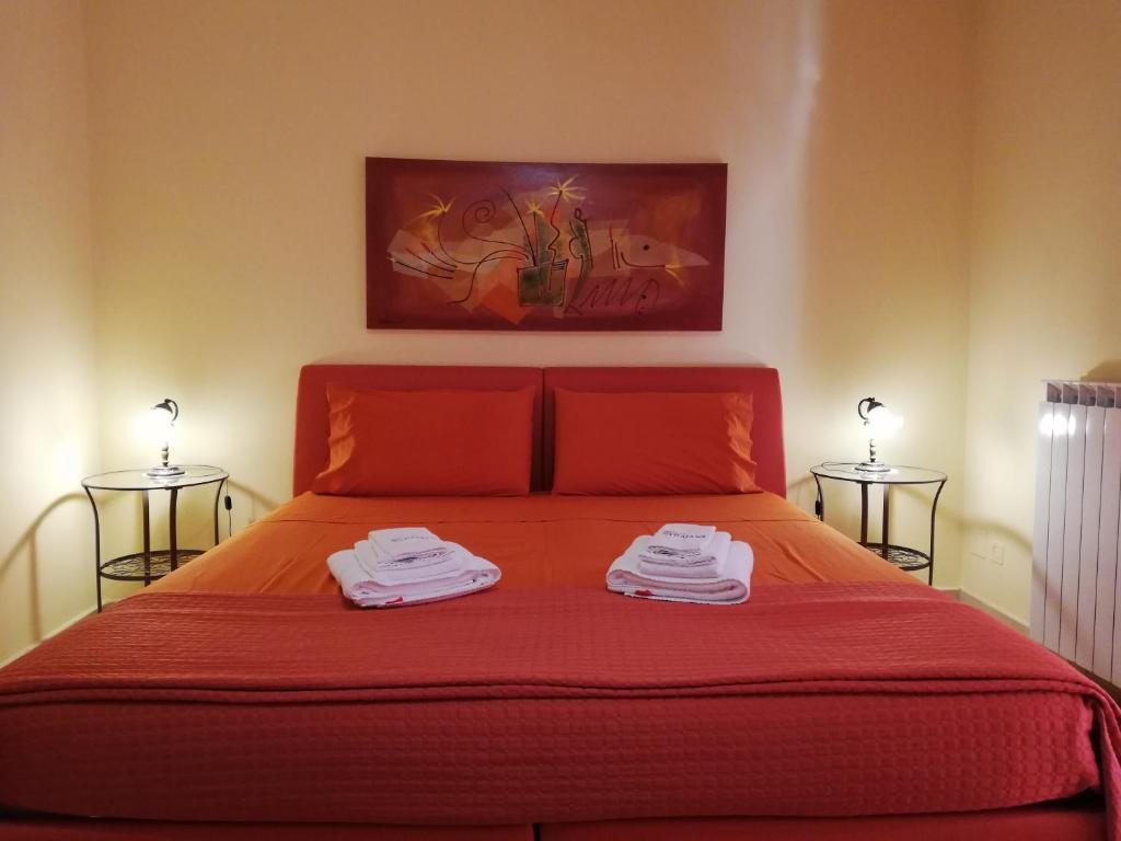 Postel nebo postele na pokoji v ubytování B&B Domus Traiani Benevento
