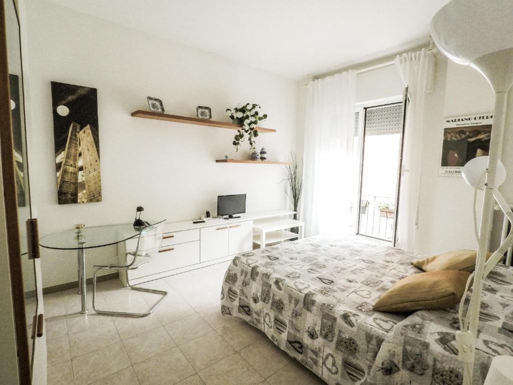 Televízia a/alebo spoločenská miestnosť v ubytovaní Residenza Riva Reno - BOLOGNA