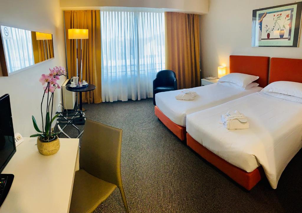 Posteľ alebo postele v izbe v ubytovaní Hotel Blaise & Francis