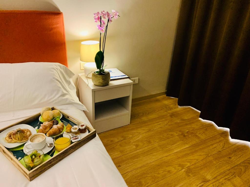 Posteľ alebo postele v izbe v ubytovaní Hotel Blaise & Francis
