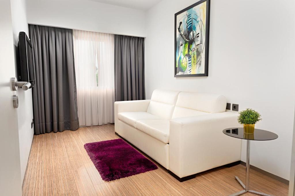 Postel nebo postele na pokoji v ubytování Hotel dos Zimbros