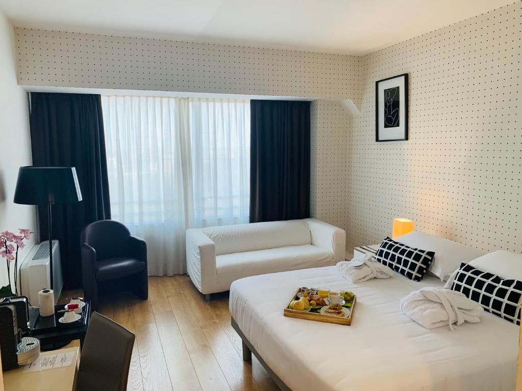 Posteľ alebo postele v izbe v ubytovaní Hotel Blaise & Francis