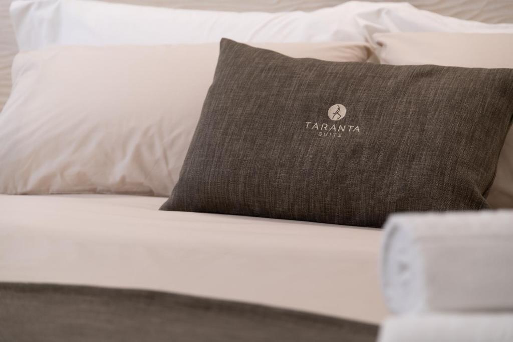 Ένα ή περισσότερα κρεβάτια σε δωμάτιο στο Taranta Suite