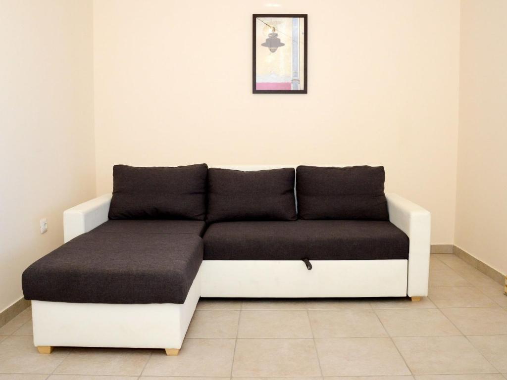 Posedenie v ubytovaní Apartment in Ljubac with Garden