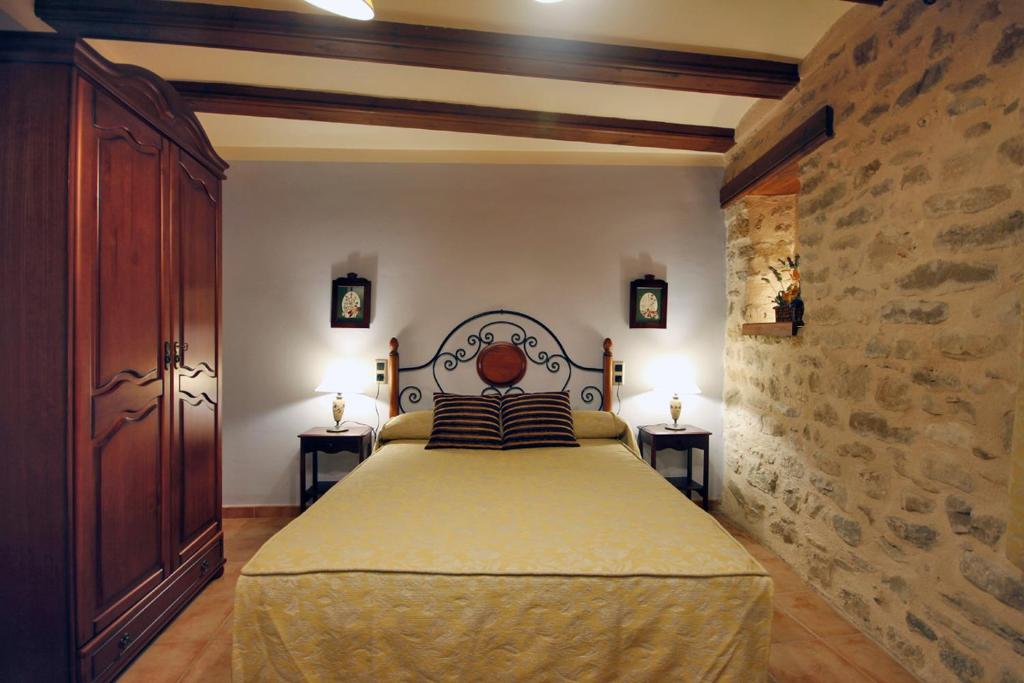 Postel nebo postele na pokoji v ubytování Apartamentos Santa Agueda