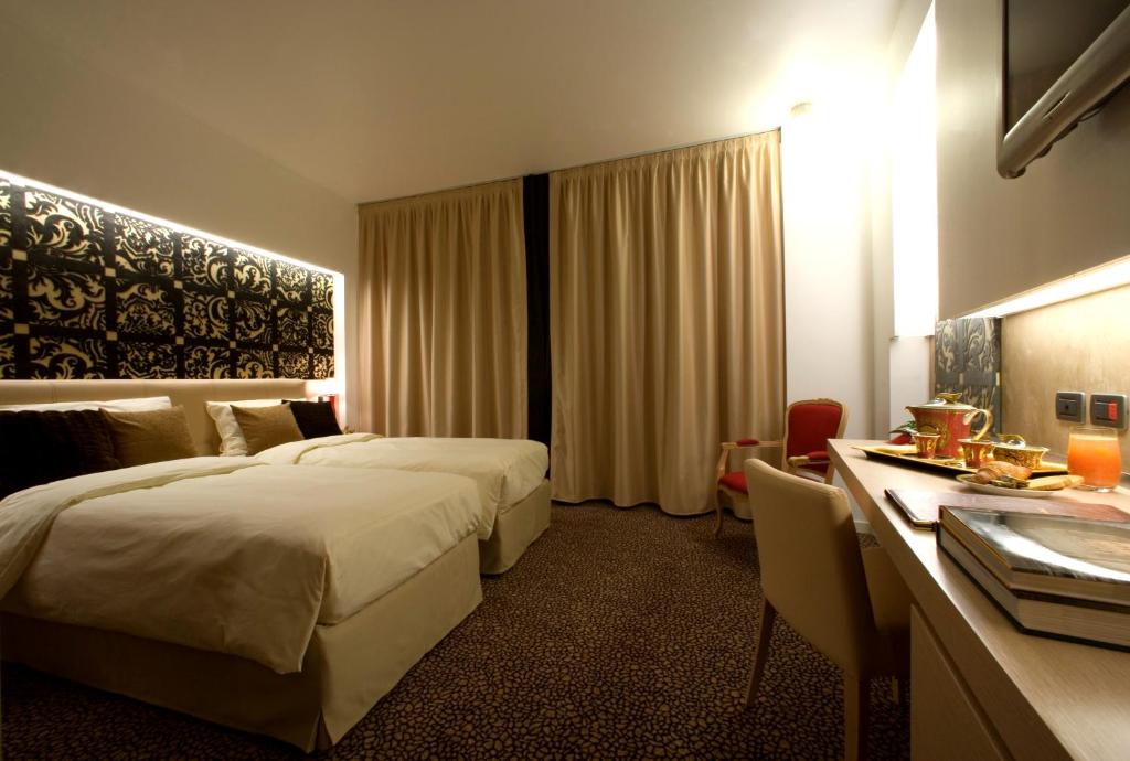 Postel nebo postele na pokoji v ubytování Antony Palace Hotel - Venice Airport