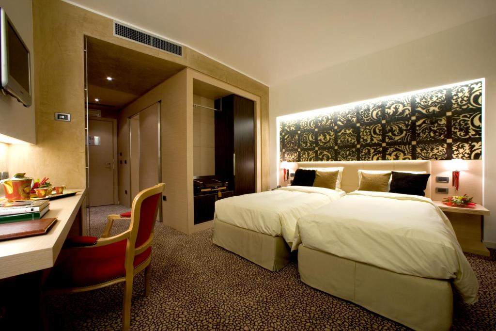Postel nebo postele na pokoji v ubytování Antony Palace Hotel - Venice Airport