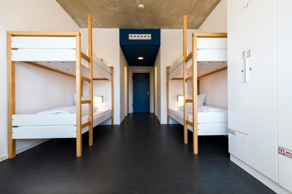 Postel nebo postele na pokoji v ubytování Jugendherberge Schweinfurt
